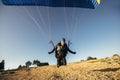 Paraglider is on the paraplane strops Royalty Free Stock Photo