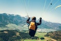 Paraglider is on the paraplane strops - soaring flight moment Royalty Free Stock Photo