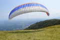 Paraglider pilot take off