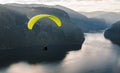 Paraglider silhouette flying over Aurlandfjord, Norway Royalty Free Stock Photo