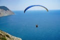 The paraglider soars freely over the sea in the sky of Anapa Royalty Free Stock Photo