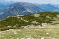 A paraglider at the start of the Krippenstein mountain in the Dachstein Mountains. Salzkammergut. Austria Royalty Free Stock Photo