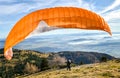 Paraglider is starting to start his flight. Royalty Free Stock Photo