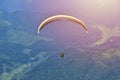 Paraglider taking off in front of spectacular mountain scenery Royalty Free Stock Photo