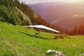 Paraglider taking off in front of spectacular mountain scenery Royalty Free Stock Photo