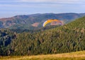 Paraglider taking off from mountain Royalty Free Stock Photo