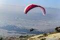Paraglider taking off from a mountain Royalty Free Stock Photo