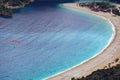 Paraglider tandem flying over the Oludeniz Beach and bay at idyllic atmosphere. Oludeniz, Fethiye, Turkey. Lycian way. Amazing