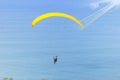 Paraglider tandem flying over the sea