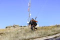 Paraglider tandem running and taking off mountain Royalty Free Stock Photo