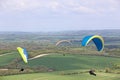 Paragliders flying from Combe Gibbet, England