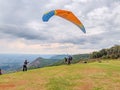 Paragliders flying over mountains