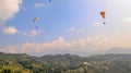 Paragliders flying over Sarangkot in Pokhara, Nepal