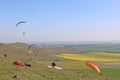 Paragliders flying wing at Milk Hill