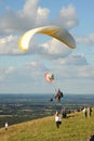 Paragliders launching from the South Downs