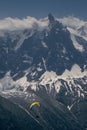 Paragliders looking for thermals amongst the snow caps of the Monte Blanc Massif, Chamonix, Royalty Free Stock Photo