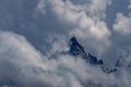 The Aiguille du Midi is a mountain in the Mont Blanc massif within the French Alps. It is a popular tourist destination and can be Royalty Free Stock Photo