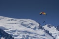 Paragliders looking for thermals amongst the snow caps of the Monte Blanc Massif, Chamonix, Royalty Free Stock Photo