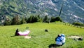 Paragliders prepare the gliders for takeoff. Hochmuth, South Tyrol, Alto Adige, Italy