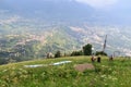 Paragliders prepare for Paragliding in front of Merano panaroma in South Tyrol