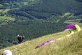 Paragliders preparing for takeoff at the summit of Puy de Dome