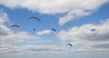 Paragliders soaring high in the sky Royalty Free Stock Photo