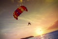 Paragliders at sunset, summer adventure in Malaysia.