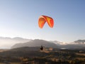 Paragliding above mountain scenery