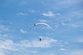Paragliding against the sky and clouds