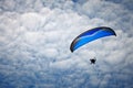 Paragliding along beautiful coastline. Royalty Free Stock Photo