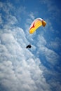 Paragliding along beautiful coastline. Royalty Free Stock Photo