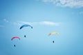 Paragliding along beautiful coastline. Royalty Free Stock Photo