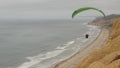 Paragliding. California Torrey Pine cliff or bluff. Paraglider soaring or flying Royalty Free Stock Photo