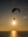 Paragliding on the cliffs of the city of Lima during sunset Royalty Free Stock Photo