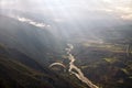 Paragliding among clouds above mountain range Royalty Free Stock Photo