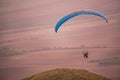 Freedom paragliding in colors of ongoing sunset