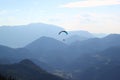 Paragliding concept: Paraglider flying / wonderful blue sky background / Paragliding in Austria / Active Lifestyle concept / Adven Royalty Free Stock Photo