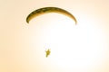 Paragliding concept, Silhouette of Paraglider on the sky and sun Royalty Free Stock Photo