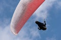 Paragliding extreme sport with blue sky and clouds Royalty Free Stock Photo