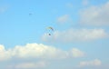 Paragliding during the flight an extreme sport in contact with the clouds of the sky Royalty Free Stock Photo