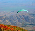 Paragliding flight over the mountains. Makedonia Royalty Free Stock Photo