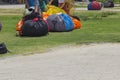 Paragliding, men`s hands bag in the bags. there is a place for text