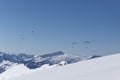 Paragliding over the Alps in winter Royalty Free Stock Photo