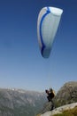 Paragliding over mountains Royalty Free Stock Photo