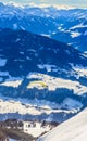 Paragliding over the mountains in winter. Ski resort Hopfgarten Royalty Free Stock Photo