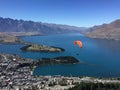 Paragliding over Queenstown New Zealand on a summers day Royalty Free Stock Photo