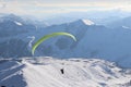 Paragliding over the snow mountains at Georgia