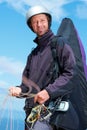 Paragliding, parachute and man with portrait in nature in preparation, exercise or health support. Athlete, face or