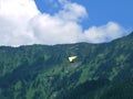 Paragliding, parachute over the mountain Royalty Free Stock Photo