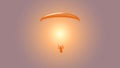 Paragliding. Paraglider flying in the sunset sky